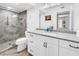 Updated bathroom with glass shower, modern vanity, and marble countertops at 6093 Bahia Del Mar Cir # 375, St Petersburg, FL 33715