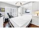 Bedroom featuring murphy bed, built-in cabinetry, and hardwood flooring at 6093 Bahia Del Mar Cir # 375, St Petersburg, FL 33715