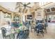 Elegant clubhouse features comfortable seating, a cozy fireplace, and lovely views of the outdoor area at 6093 Bahia Del Mar Cir # 375, St Petersburg, FL 33715