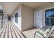 The charming exterior entryway of this beautiful condo features comfortable seating at 6093 Bahia Del Mar Cir # 375, St Petersburg, FL 33715