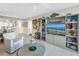 Bright living room features neutral decor, tile floors, and a flat-screen TV, offering a cozy atmosphere at 6093 Bahia Del Mar Cir # 375, St Petersburg, FL 33715