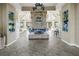 Elegant lobby with stone fireplace, tiled floors, and comfortable seating areas at 6093 Bahia Del Mar Cir # 375, St Petersburg, FL 33715