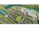 A stunning aerial view of the community's amenities, including pools, tennis courts, clubhouse, playground, and lush landscaping at 2416 Wise River Ln, Zephyrhills, FL 33541