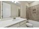 Bathroom featuring a single vanity, modern fixtures, and a shower/tub combination with tile surround at 2416 Wise River Ln, Zephyrhills, FL 33541