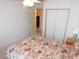 Neutral bedroom with a ceiling fan and closet, offering a calming atmosphere at 36819 Kiowa Ave, Zephyrhills, FL 33542