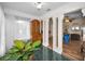 Inviting entryway featuring unique architectural details and a bright, airy atmosphere at 546 Orangewood Dr, Dunedin, FL 34698