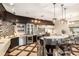 Modern kitchen with stainless steel appliances, a center island, and stylish backsplash at 5701 S Macdill Ave, Tampa, FL 33611