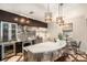 Modern kitchen with stylish countertops and stainless steel appliances, complemented by pendant lighting at 5701 S Macdill Ave, Tampa, FL 33611