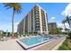 Beautiful condominium complex featuring a large pool and stunning waterfront views at 690 Island Way # 802, Clearwater Beach, FL 33767