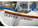 Closeup of a Tarpon Springs boat, showcasing its name and highlighting the area's maritime heritage at 1010 Bowsprit Ln # 0, Holiday, FL 34691