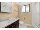 Bathroom with updated vanity, toilet, and shower at 1110 W Coral St, Tampa, FL 33602