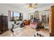 Bedroom with natural light, a mirrored closet, and a ceiling fan for a comfortable atmosphere at 1110 W Coral St, Tampa, FL 33602
