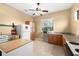 Kitchen featuring wood cabinets and stainless steel appliances at 1110 W Coral St, Tampa, FL 33602