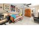 Cozy living room with tile floor, ceiling fan, and unique furniture at 1110 W Coral St, Tampa, FL 33602