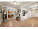 Open-concept living room with tile flooring and an open view into the kitchen at 1110 W Coral St, Tampa, FL 33602