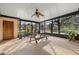 Enclosed patio featuring ceiling fan, and tile flooring at 1110 W Coral St, Tampa, FL 33602