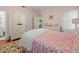 Comfortable main bedroom featuring a closet, large dresser, and bright natural light at 320 N Madison Ave, Clearwater, FL 33755