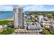 View of the luxury condominium with a rooftop pool, parking, and walking distance to city amenities at 331 Cleveland St # 1102, Clearwater, FL 33755