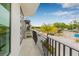 Balcony view includes metal railings, new construction, and tropical trees for outdoor serenity at 460 87Th Avenue North, St Petersburg, FL 33702