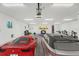 Spacious garage featuring room for multiple cars, gym equipment, overhead lighting, and ample space at 460 87Th Avenue North, St Petersburg, FL 33702
