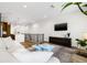 Open living space with combined kitchen and living room and hardwood flooring at 460 87Th Avenue North, St Petersburg, FL 33702
