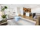 Open concept living room flows into the kitchen, perfect for entertaining and easy living at 484 87Th Avenue North, St Petersburg, FL 33702