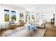 Sun-lit living room with comfortable seating and stylish accents at 484 87Th Avenue North, St Petersburg, FL 33702