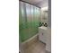 Bathroom featuring a shower-tub combo, shower curtain, and white vanity at 5209 10Th S Ave, Gulfport, FL 33707