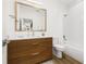 Bathroom featuring sleek vanity with wood cabinets and a bath/shower at 8631 5Th Street North, St Petersburg, FL 33702