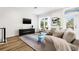 Stylish living room showcasing a modern entertainment center and comfortable seating area at 8631 5Th Street North, St Petersburg, FL 33702
