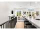 Well-lit living room overlooking the kitchen, featuring comfortable seating and modern decor at 8631 5Th Street North, St Petersburg, FL 33702