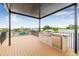 Rooftop outdoor kitchen featuring stainless steel grill offering a luxurious entertainment space with a hot tub at 8631 5Th Street North, St Petersburg, FL 33702