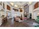 Clubhouse lobby area with fireplace, ample seating and shared workspaces at 2254 Chianti Pl # 68, Palm Harbor, FL 34683