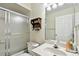 Bathroom featuring a shower and tub combo and single vanity at 37401 Wedgewood Dr, Zephyrhills, FL 33542