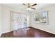 Bright dining room with sliding glass doors to the porch and large window overlooking the yard at 37401 Wedgewood Dr, Zephyrhills, FL 33542