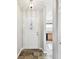 Entryway with tile flooring leading to the kitchen at 37401 Wedgewood Dr, Zephyrhills, FL 33542