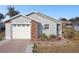 Charming single-story home with brick accents and a well-manicured front yard at 37401 Wedgewood Dr, Zephyrhills, FL 33542