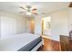 Main bedroom with hardwood floors, double closet and ensuite bathroom at 37401 Wedgewood Dr, Zephyrhills, FL 33542