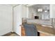 Office area featuring tile backsplash, built in desk, and natural light at 37401 Wedgewood Dr, Zephyrhills, FL 33542