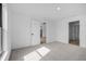 Spacious bedroom with neutral carpet, and an ensuite bathroom, perfect for relaxing at 4294 Danbury St, North Port, FL 34286
