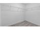 Walk-in closet with carpeted floor and metal shelving for maximum storage at 4294 Danbury St, North Port, FL 34286