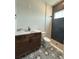 Updated bathroom featuring a modern vanity, stylish tile flooring, and walk-in shower at 441 42Nd Ne Ave, St Petersburg, FL 33703