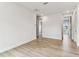 Bright bedroom with hardwood floors, white walls, and recessed lighting at 441 42Nd Ne Ave, St Petersburg, FL 33703