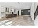 Open concept kitchen features a large island, modern cabinets, and stainless steel appliances at 441 42Nd Ne Ave, St Petersburg, FL 33703