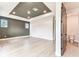 Spacious main bedroom with tray ceiling, shiplap accent wall and modern recessed lights at 441 42Nd Ne Ave, St Petersburg, FL 33703