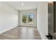 Home office with wood flooring, two windows offering outdoor views at 441 42Nd Ne Ave, St Petersburg, FL 33703