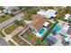 Aerial view of a beautiful house with a clean swimming pool and well-kept backyard at 4701 Lodestone Dr, Tampa, FL 33615