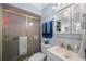 The bathroom has a shower with a glass door at 4701 Lodestone Dr, Tampa, FL 33615