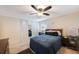 The bedroom has a ceiling fan and natural light at 4701 Lodestone Dr, Tampa, FL 33615