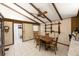 Bright dining room featuring a beamed ceiling and classic design at 4701 Lodestone Dr, Tampa, FL 33615